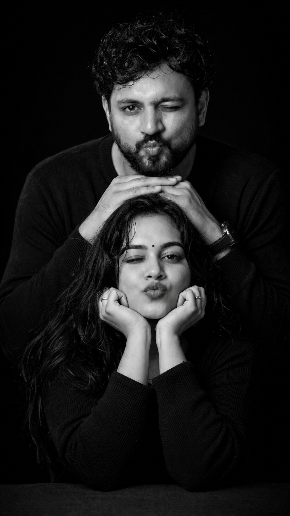 Playful couple in monochrome portrait