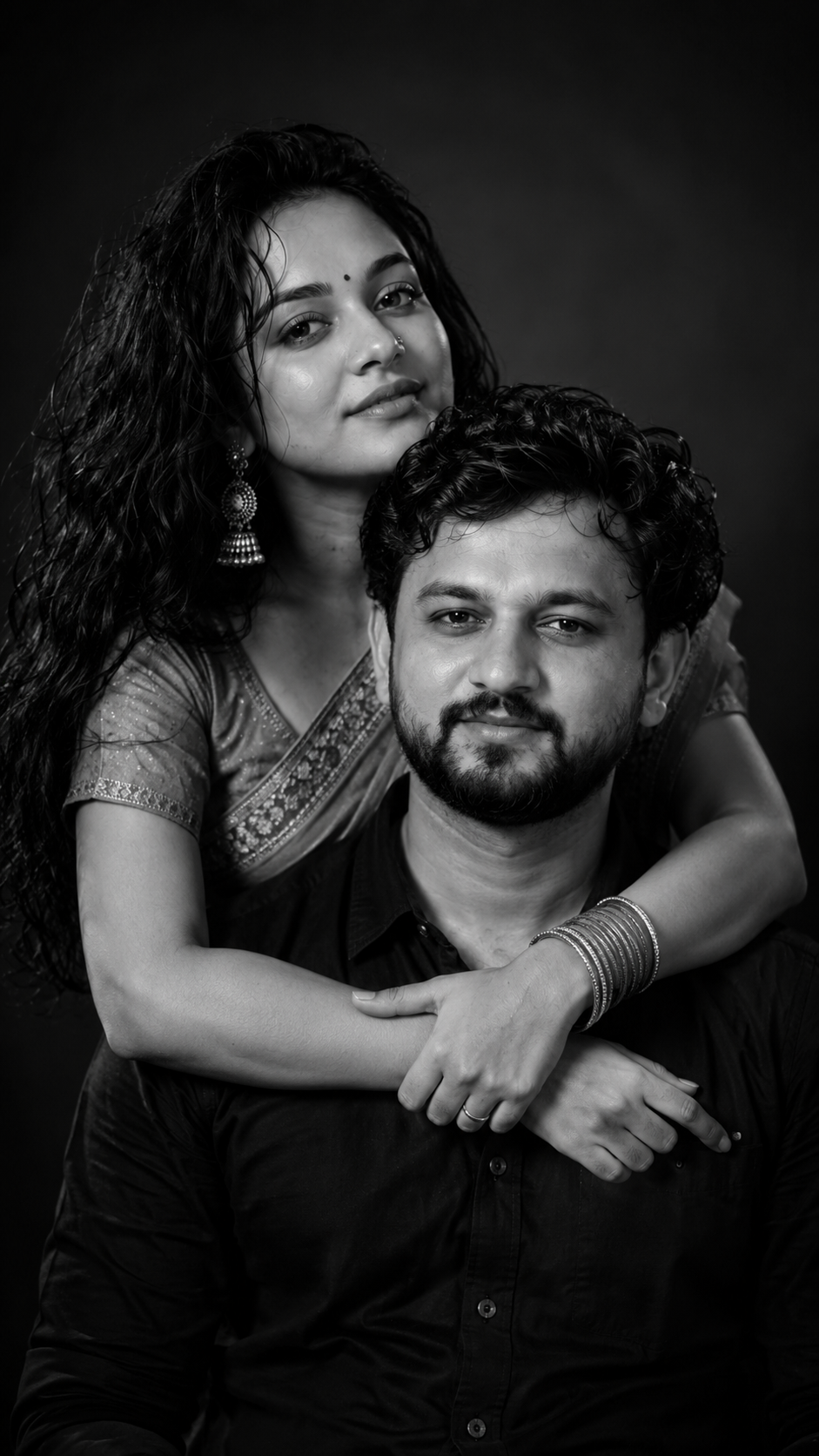 Intimate black-and-white portrait of a couple