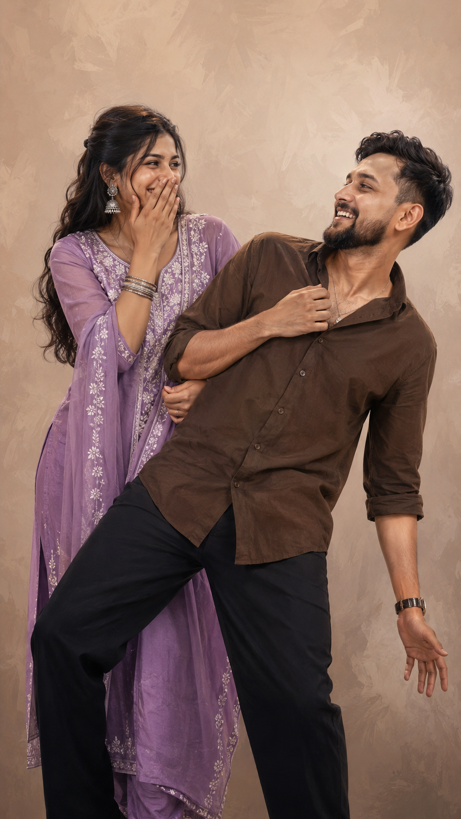 Playful couple in a warm studio portrait