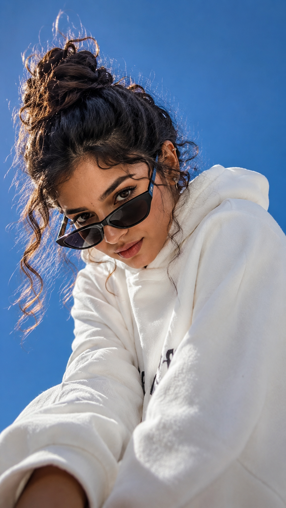 Confident gaze under the blue sky