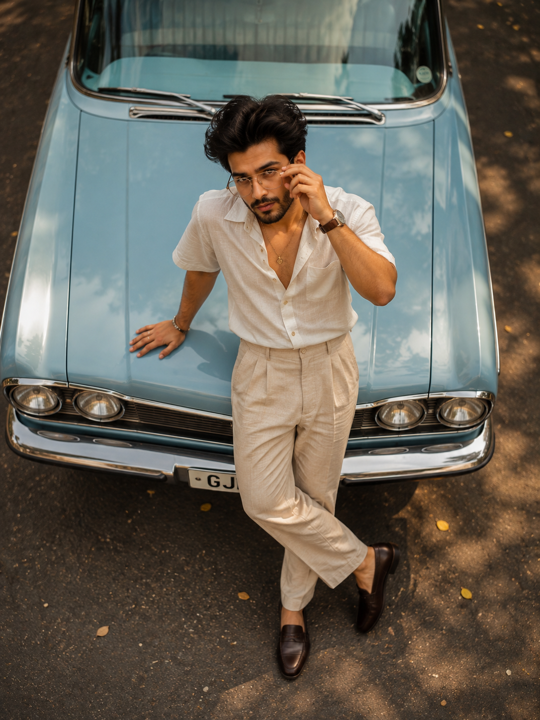 Retro Portrait by a Vintage Blue Car